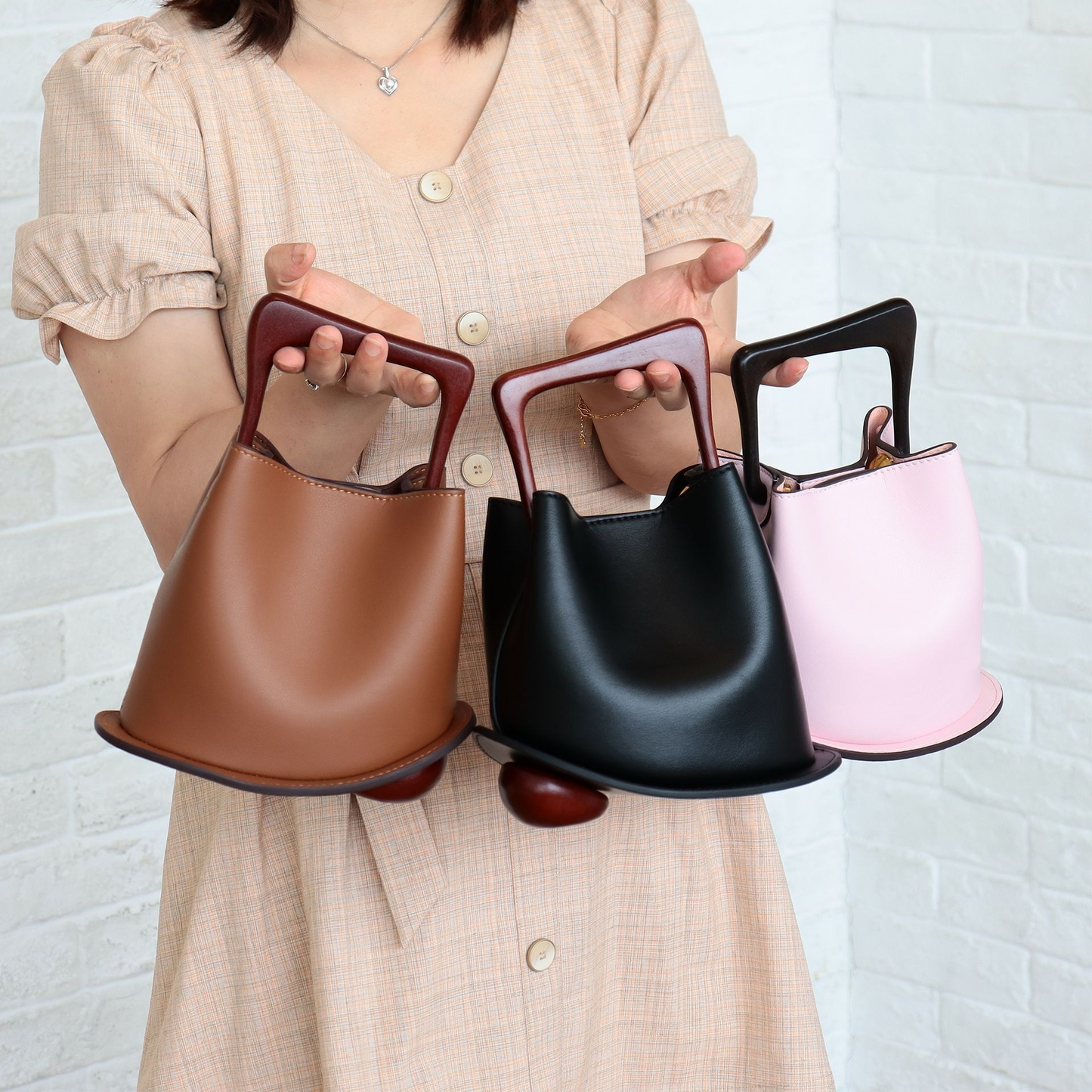 QUINN Cowhide Leather Bucket Bag